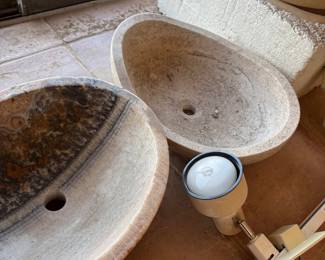 Natural Stone Vessel Sinks
A pair of beautifully crafted stone vessel sinks in earthy tones, ideal for adding a rustic, spa-like touch to any bathroom or kitchen remodel.