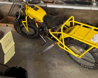 969 Rokon Trailbreaker Motorcycle
A yellow 1969 fully restored Rokon Trailbreaker motorcycle. This rare and collectible off-road bike is a standout piece for motorcycle enthusiasts or adventurers.