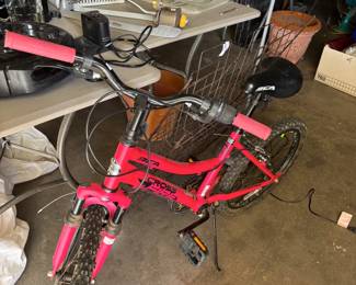 Pink BMX Bicycle
A bright pink BMX bike with sturdy tires and ergonomic handlebars, ready for outdoor adventures. Perfect for kids or teens.