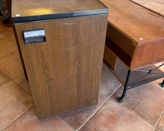 Wooden Cabinet with Table:
A mid-century style wooden cabinet and table, ideal for storage or as a charming addition to your living space.