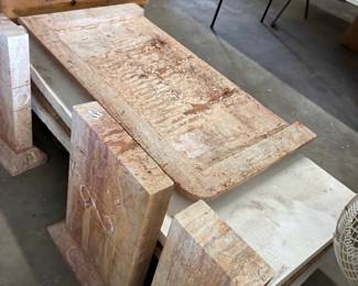 Natural Stone Architectural Pieces
A selection of natural stone slabs and decorative pieces, ideal for garden paths, tabletops, or unique interior design projects. The earthy tones and texture add a rustic charm.