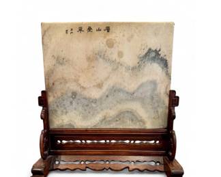 17th c. Chan tradition Marble Panel (depicting black mountains with cloudy sky).  Marble is set in a 19th c. Chinese carved and pierced teakwood trestle-base table screen.