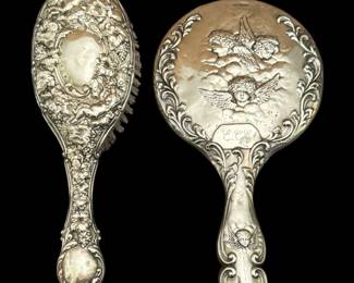 English Victorian sterling with beveled glass hand mirror made in Chester and sterling handled hairbrush