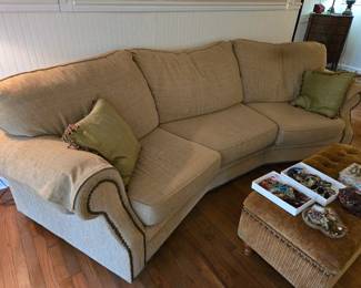 Clean nice and comfortable couch with a unique curved design. Once again a neutral color and I repeat comfortable!