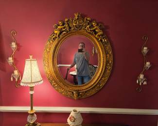 No that is not a Greek god in the picture...that's a mirror and that's me Chris!
