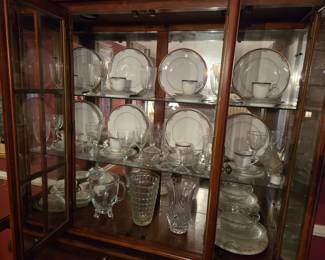 This China Cabinet is breathtaking with glass across the front and sides. Would be beautiful in any home.