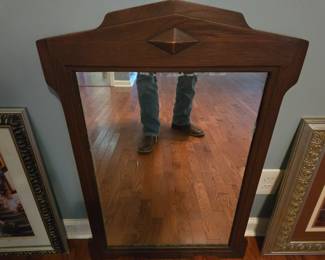 Great old heavy mirror! Is cool the way it is, or would be an easy paint project.