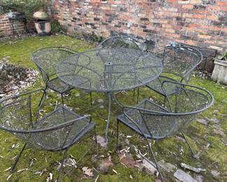 Mesh wrought iron patio table and 5 chairs 