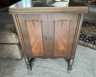 sewing cabinet with White sewing machine