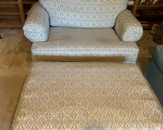  Nice newer chair and a half with ottoman on wheels