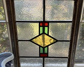 stained glass window believed to be from the original St. Thomas building