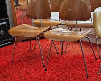 Herman Miller molded plywood chairs, set of four, one has a broken piece