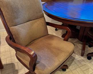 Wooden Dining table with 4 rolling chairs