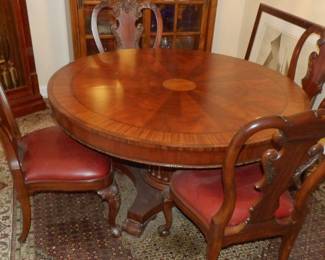 Round Empire Style Dining Table With Six Chairs and Two Leaves