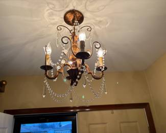 . . . impressive chandelier -- available for sale on the condition buyer replaces it with a light fixture