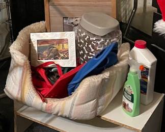 Dog items, large crate against wall and one in the back yard too