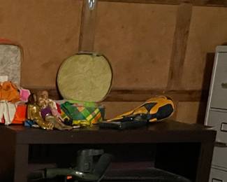 Vintage Barbie dolls, clothes, and cases.  Filing cabinet.  TV Stand with drawers (great for a bedroom)