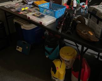 More fishing items and a cooler items (other coolers also in garage but not pictured)