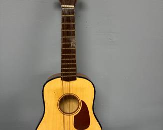 Small child’s guitar