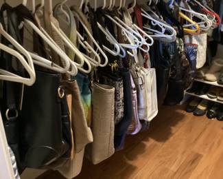 Many ladies handbags and purses