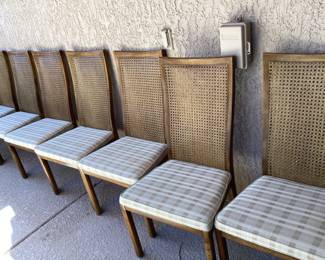 Seven upholstered with Kane back dining room chairs