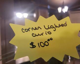 CORNER LIGHTED CURIO $100