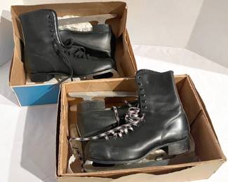 Two Pairs Of Vintage Ice Skates