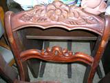 6 chairs with flower backs 2 have arms