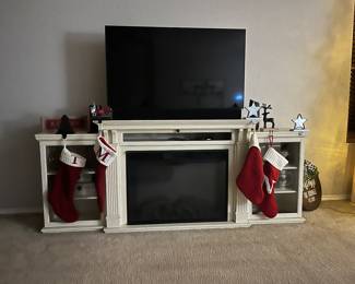Tv stand/ fireplace! Beautiful and provides heat. TV for sale as well!