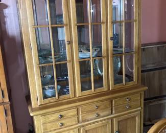 Thomasville oak china cabinet. The top comes off so that the base can be used alone as a buffet.