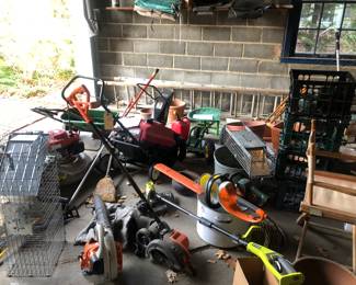 Garage is full with Lawn, garden and potting equipment