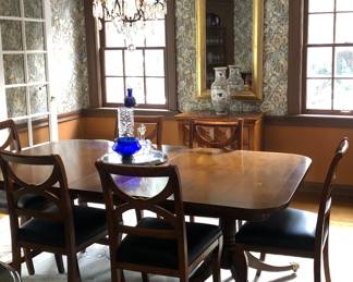 Double pedestal, dining table witch 2 leaves & 6 chairs. The chairs are newer than the Dining Table and are made in Italy