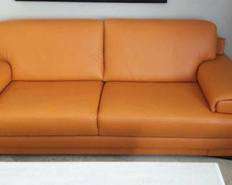 Sleek Orange Leather Sofa