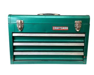 TEWA207 Craftsman Tool Box With Tools Tool box has a top compartment and 3 shelves. Comes with all different kind of tools. Tool box does have some wear to it.
