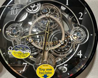 RHYTHM CLOCK plays tunes Brand NEW w/box Clock at Cost ….Model is ‘Gadget’ ….Light sensitive / doesn’t play at night time…’gears turn when tune plays .. (2) available