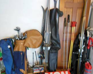 golf clubs and snow skis