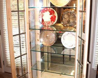 Lighted Curio Cabinet w/beveled glass & four glass shelves. 81" H x 35" W x 16" D.