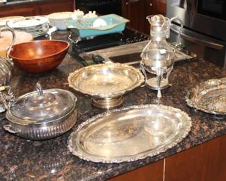 Silver plated serving pieces.