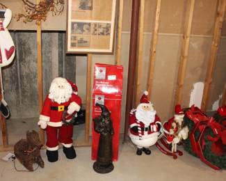 Variety of Christmas items and wreaths.