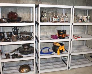 Multiple five shelf shelving units for sale. Vintage Jim Beam bottles and beer steins.