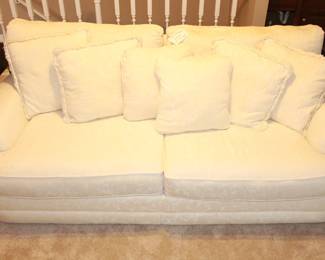 Four Cushion, Cream Colored Sofa. 90" Long.