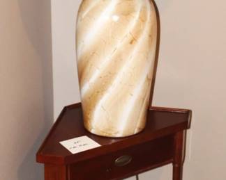 Corner table with lamp.