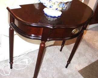 Demi-Lune One Drawer Table.