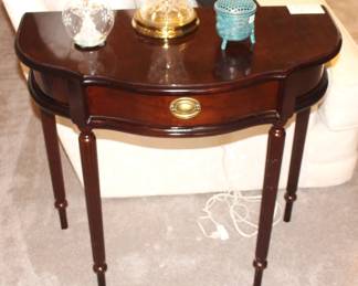 Demi-Lune One Drawer Table.