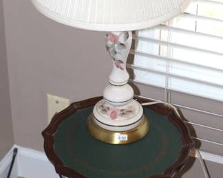 Leather top table with lamp.