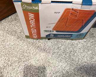Heated throw blanket