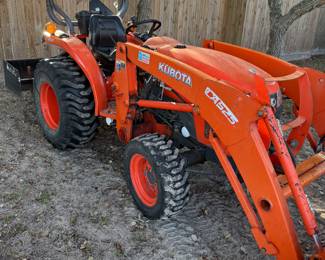 Tractor is a 2016 Kubota L2501. With a bucket loader and a box blade. Has a trailer ball hitch and a spreader. There is an hour meter in the tachometer. It’s around 500 hours. 11500.00
