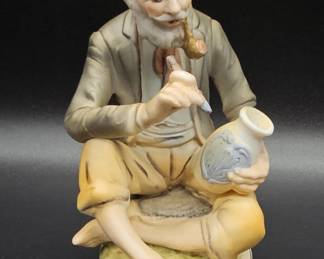 Vintage Ceramic Potter Figurine