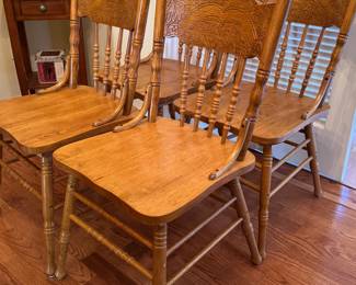 Carved oak dining chairs - set of 4