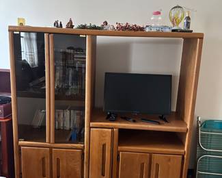 Entertainment center, dvds, small tv, misc. holiday decor items